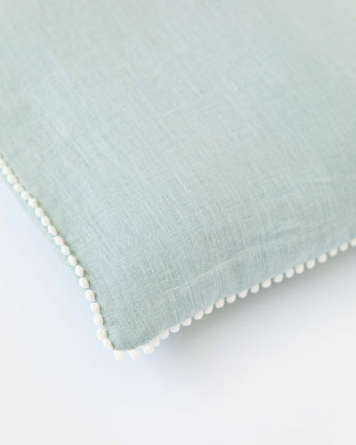 Cushion cover with pom poms in Dusty blue - sneakstylesanctums
