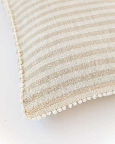 Cushion cover with pom poms in Striped in natural - sneakstylesanctums